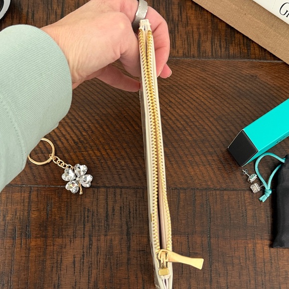 **Bundle** Kate Spade Ivory Pouch with Metallic Gold Dots, earrings & bag charm! - Picture 6 of 8